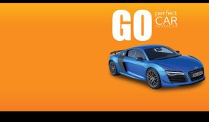 Navy blue sports car with matte black rear wing against an orange background