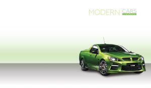 A green special pickup on a grey and pastel green backdrop