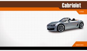 Metallic gray sports roadster on a white grid paper backdrop