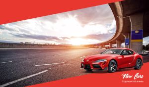 A red luxury sports car under a city viaduct bridge on a red background