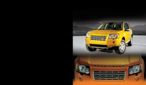 Yellow off-roader full-face and front views on black with orange bottom