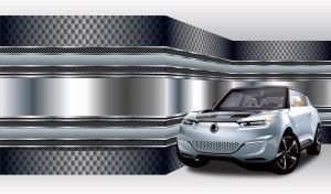 Silver electric SUV stands in the corner of a grey honeycomb patterned room