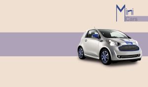 Brand new sliver and blue mini car against a beige background