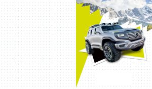 Luxury matte gray G-class car against a torn picture of rocky mountains