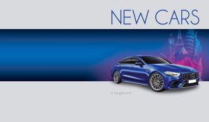 An ultramarine 4-door executive coupe against a grey backdrop with a navy stripe