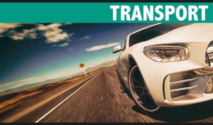 A sleek white-beige sports car front view on the highway