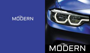 Close-up of a matte blue modern sports car headlight on navy